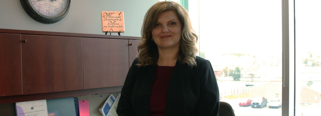 Photo of Julie Trpkovski in an office